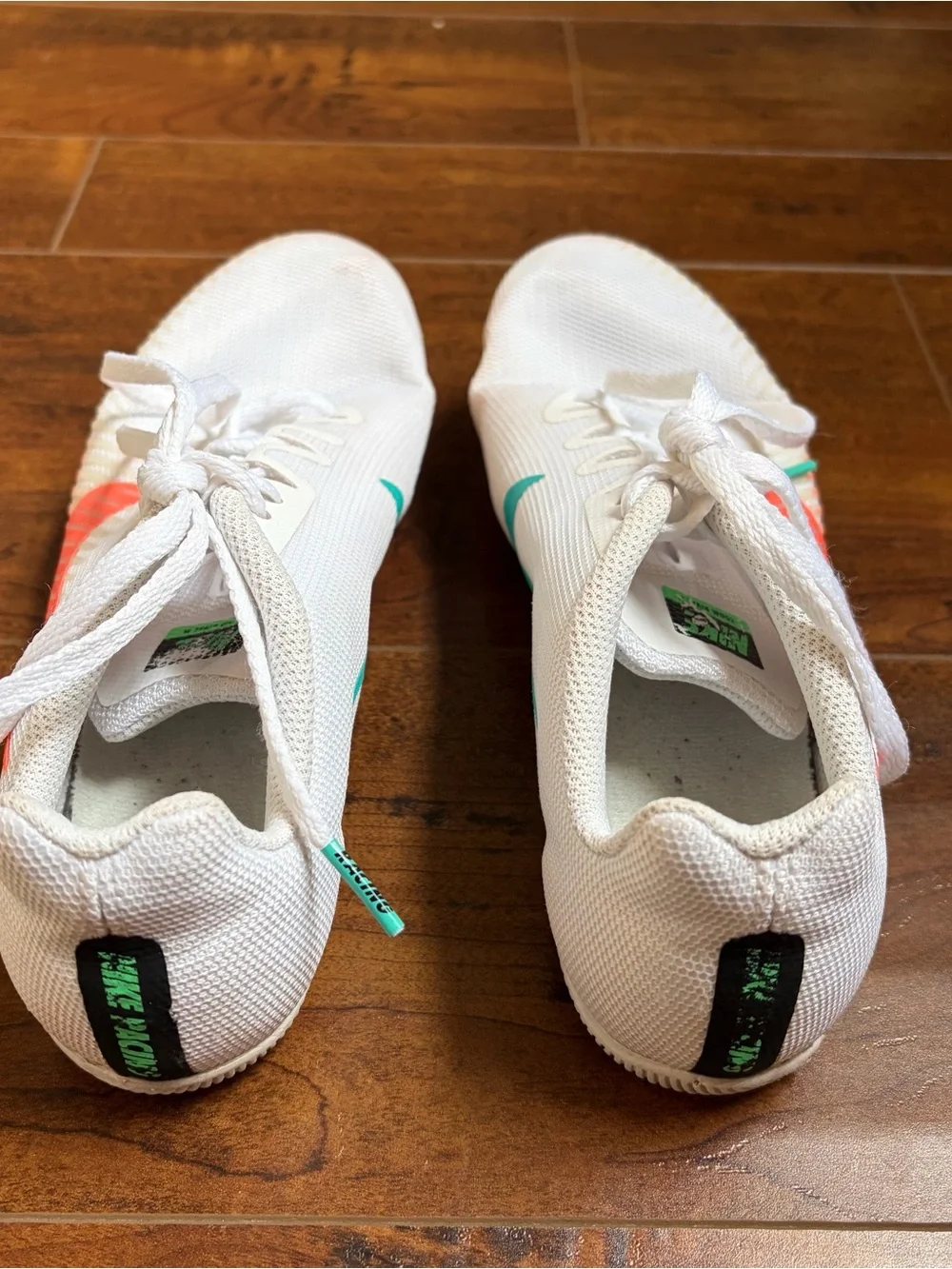 Nike Women’s White Track Spikes with Coral & Teal Accents